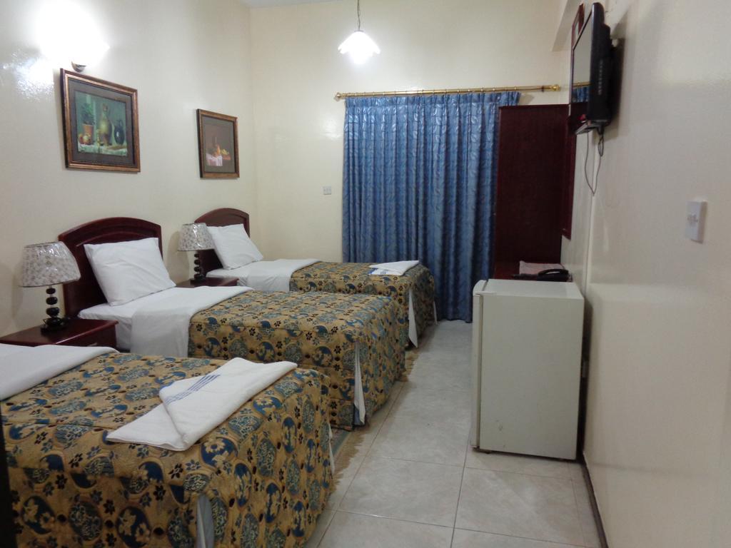 Deira Palace Hotel Dubái Habitación foto